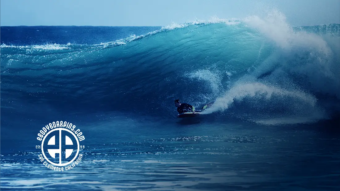 ebodyboarding.com logo with bodysurfer ocean background and large wave