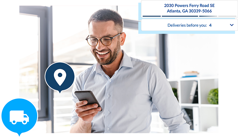 Photo of happy customer viewing notification and tracking on a smartphone.